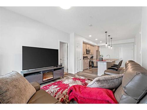 2208-220 Seton Grove Se, Calgary, AB - Indoor Photo Showing Living Room