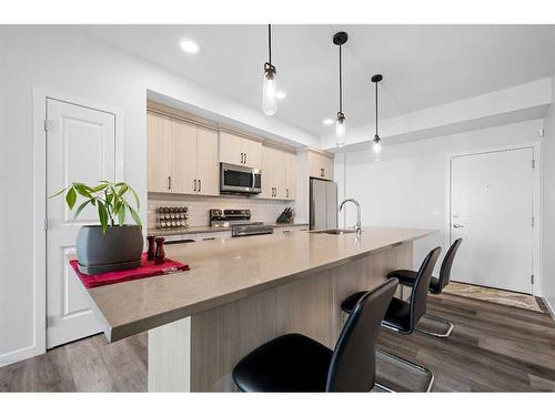 2208-220 Seton Grove Se, Calgary, AB - Indoor Photo Showing Kitchen With Upgraded Kitchen