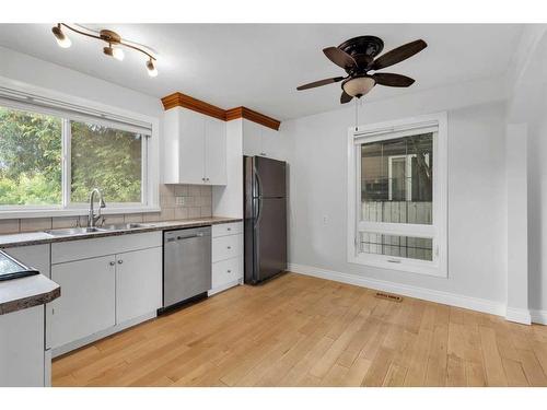 635 Arlington Drive Se, Calgary, AB - Indoor Photo Showing Kitchen With Double Sink