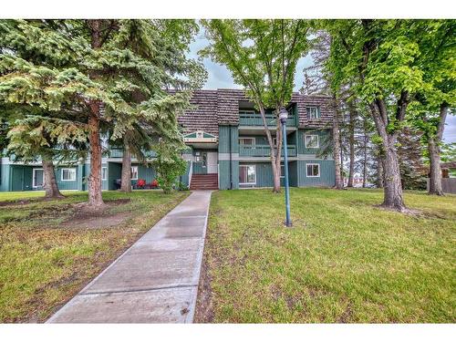 1316-315 Southampton Drive Sw, Calgary, AB - Indoor Photo Showing Other Room With Fireplace