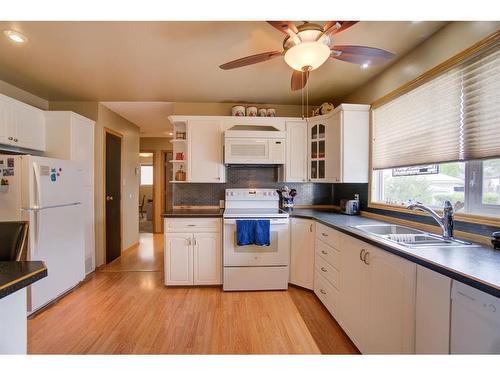 4908 8 Street West, Claresholm, AB - Indoor Photo Showing Kitchen With Double Sink