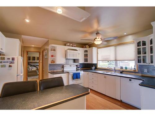 4908 8 Street West, Claresholm, AB - Indoor Photo Showing Kitchen With Double Sink