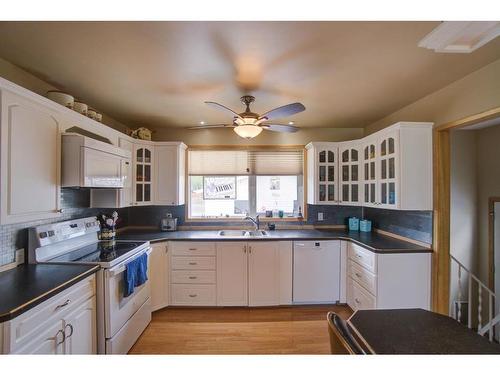 4908 8 Street West, Claresholm, AB - Indoor Photo Showing Kitchen With Double Sink