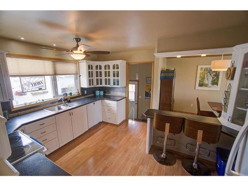 4908 8 Street West, Claresholm, AB - Indoor Photo Showing Kitchen With Double Sink