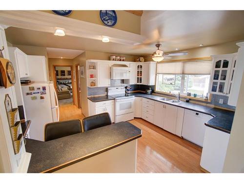 4908 8 Street West, Claresholm, AB - Indoor Photo Showing Kitchen With Double Sink