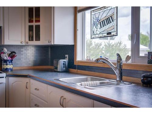 4908 8 Street West, Claresholm, AB - Indoor Photo Showing Kitchen With Double Sink