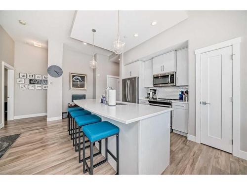 103-38 Quarry Gate Se, Calgary, AB - Indoor Photo Showing Kitchen With Upgraded Kitchen