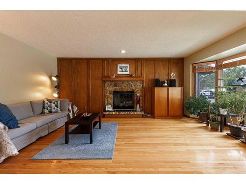 159 Deerbow Circle Se, Calgary, AB - Indoor Photo Showing Living Room With Fireplace