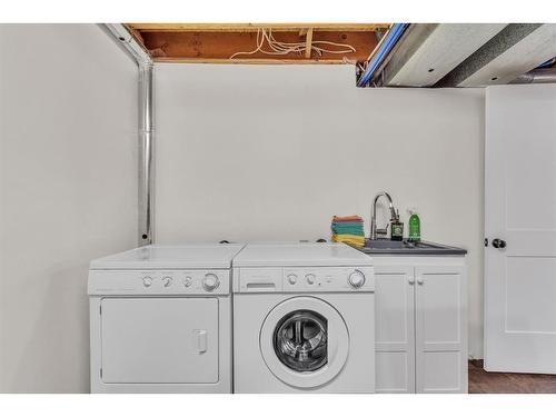 104-5810 Patina Drive Sw, Calgary, AB - Indoor Photo Showing Laundry Room
