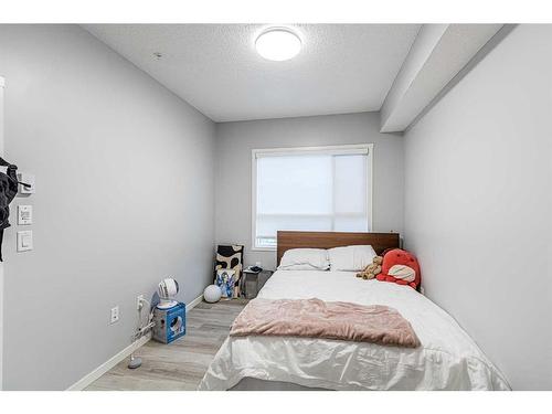 301-40 Carrington Plaza Nw, Calgary, AB - Indoor Photo Showing Bedroom