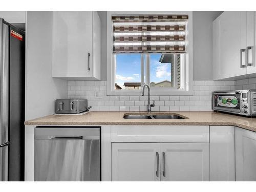 1568 Cornerstone Boulevard Ne, Calgary, AB - Indoor Photo Showing Kitchen With Double Sink