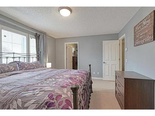 119 Prestwick Point Se, Calgary, AB - Indoor Photo Showing Bedroom