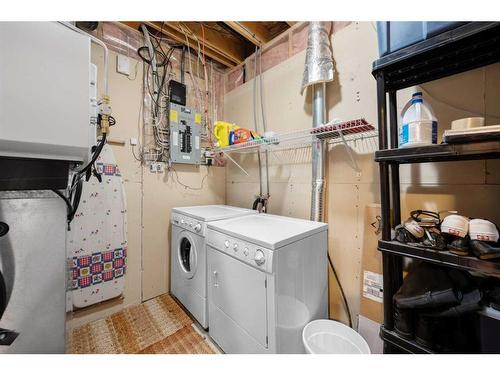 102 Hidden Crescent Nw, Calgary, AB - Indoor Photo Showing Laundry Room