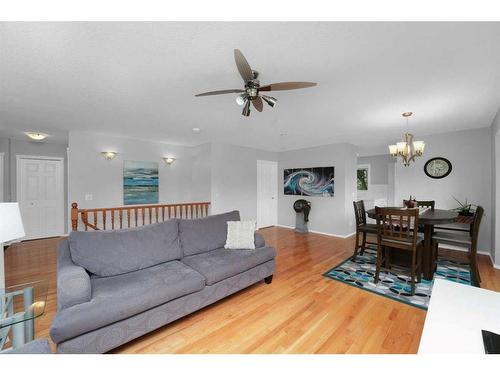 195 Sandstone Drive, Okotoks, AB - Indoor Photo Showing Living Room