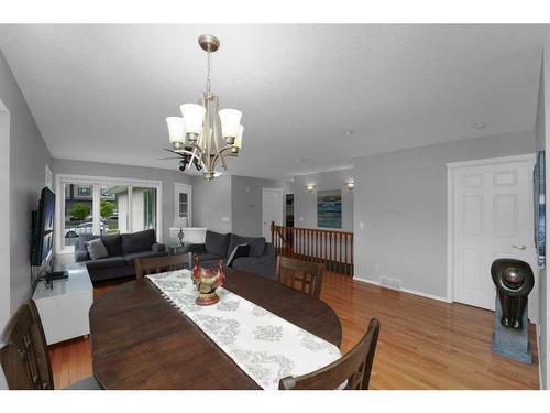 195 Sandstone Drive, Okotoks, AB - Indoor Photo Showing Dining Room