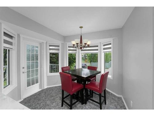 195 Sandstone Drive, Okotoks, AB - Indoor Photo Showing Dining Room