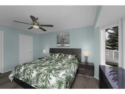 195 Sandstone Drive, Okotoks, AB - Indoor Photo Showing Bedroom