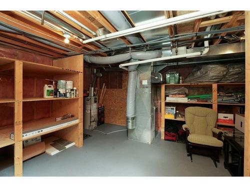 195 Sandstone Drive, Okotoks, AB - Indoor Photo Showing Basement