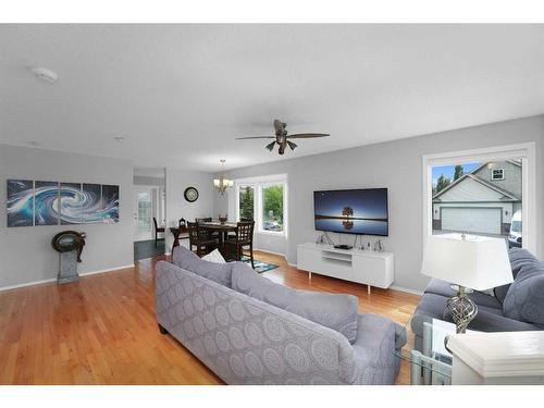 195 Sandstone Drive, Okotoks, AB - Indoor Photo Showing Living Room