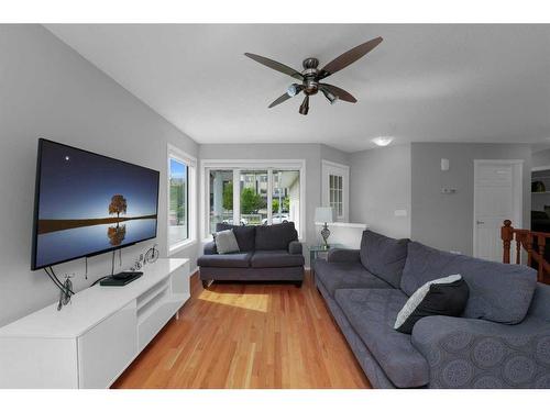 195 Sandstone Drive, Okotoks, AB - Indoor Photo Showing Living Room