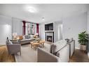 104-990 Centre Avenue Ne, Calgary, AB  - Indoor Photo Showing Living Room With Fireplace 