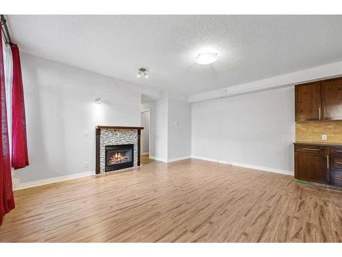 104-990 Centre Avenue Ne, Calgary, AB - Indoor With Fireplace