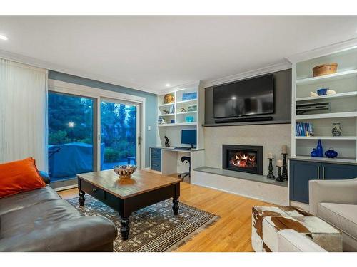 10616 Willowind Place Se, Calgary, AB - Indoor Photo Showing Living Room With Fireplace