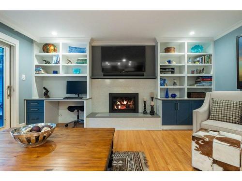 10616 Willowind Place Se, Calgary, AB - Indoor Photo Showing Living Room With Fireplace