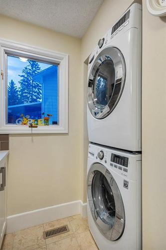 10616 Willowind Place Se, Calgary, AB - Indoor Photo Showing Laundry Room