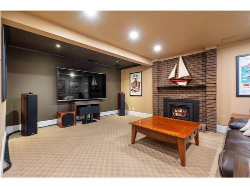 10616 Willowind Place Se, Calgary, AB - Indoor Photo Showing Living Room With Fireplace