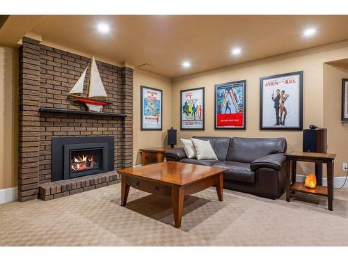 10616 Willowind Place Se, Calgary, AB - Indoor Photo Showing Living Room With Fireplace