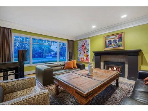 10616 Willowind Place Se, Calgary, AB - Indoor Photo Showing Living Room With Fireplace