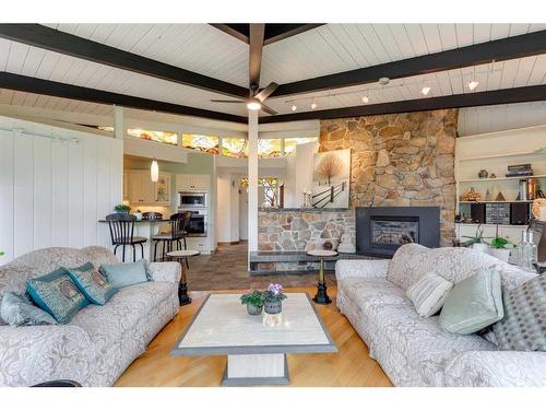 12 37 Street Sw, Calgary, AB - Indoor Photo Showing Living Room With Fireplace