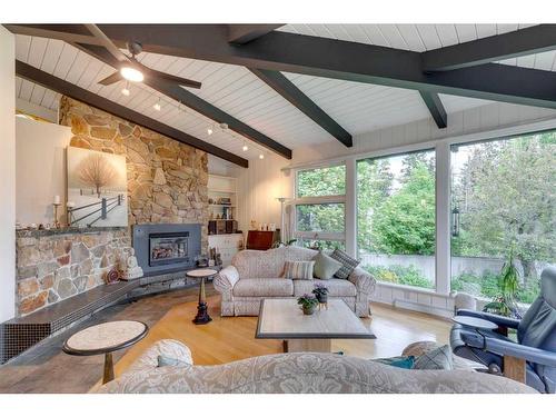 12 37 Street Sw, Calgary, AB - Indoor Photo Showing Living Room With Fireplace