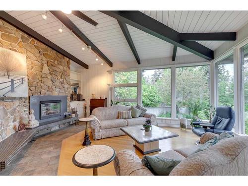 12 37 Street Sw, Calgary, AB - Indoor Photo Showing Living Room With Fireplace