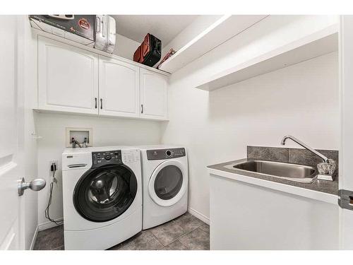 108 Hidden Creek Circle Nw, Calgary, AB - Indoor Photo Showing Laundry Room