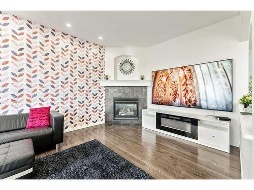 108 Hidden Creek Circle Nw, Calgary, AB - Indoor Photo Showing Living Room With Fireplace