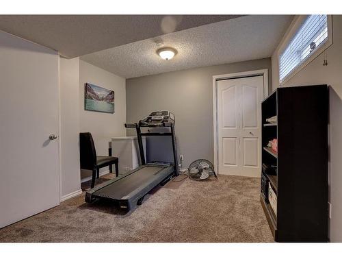 279 Coventry Circle Ne, Calgary, AB - Indoor Photo Showing Gym Room
