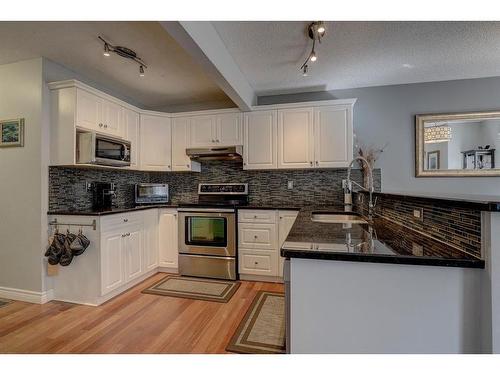 279 Coventry Circle Ne, Calgary, AB - Indoor Photo Showing Kitchen With Stainless Steel Kitchen