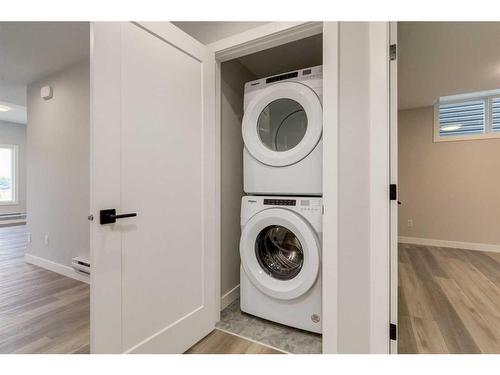 241 Crimson Ridge Place Nw, Calgary, AB - Indoor Photo Showing Laundry Room