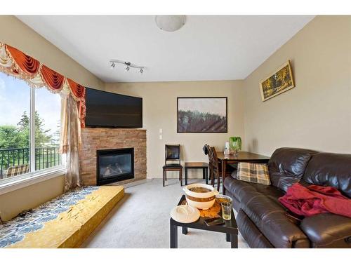 171 Taralake Way Ne, Calgary, AB - Indoor Photo Showing Living Room With Fireplace