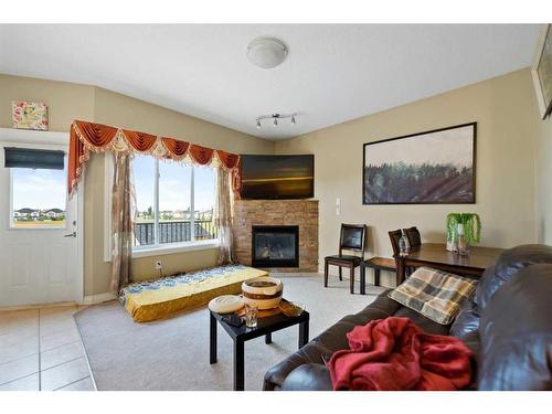 171 Taralake Way Ne, Calgary, AB - Indoor Photo Showing Living Room With Fireplace