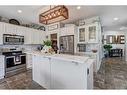 187 Reunion Close Nw, Airdrie, AB  - Indoor Photo Showing Kitchen With Stainless Steel Kitchen With Upgraded Kitchen 