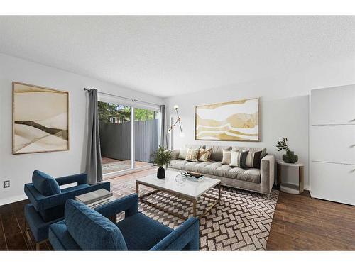 129-210 86 Avenue Se, Calgary, AB - Indoor Photo Showing Living Room