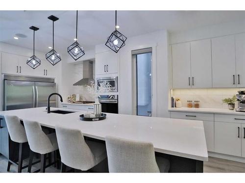 708 13 Street Ne, Calgary, AB - Indoor Photo Showing Kitchen With Stainless Steel Kitchen With Upgraded Kitchen