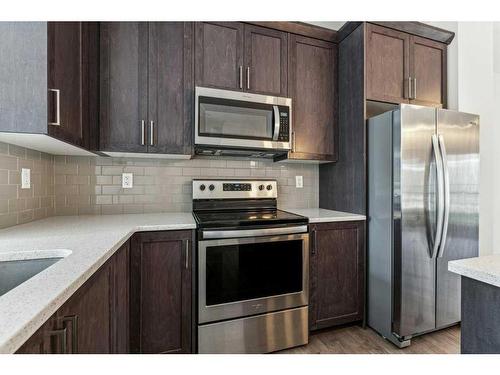 123 Legacy Point Se, Calgary, AB - Indoor Photo Showing Kitchen With Upgraded Kitchen