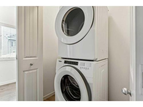 123 Legacy Point Se, Calgary, AB - Indoor Photo Showing Laundry Room