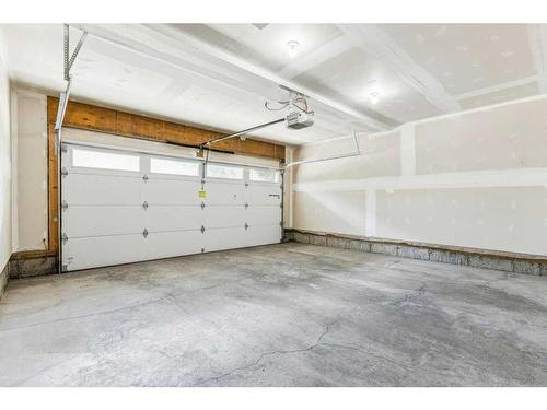 123 Legacy Point Se, Calgary, AB - Indoor Photo Showing Garage