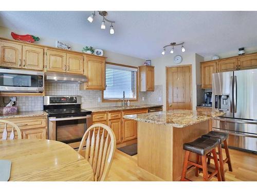 247 Hamptons Park Nw, Calgary, AB - Indoor Photo Showing Kitchen With Stainless Steel Kitchen With Double Sink