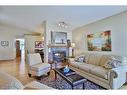 247 Hamptons Park Nw, Calgary, AB  - Indoor Photo Showing Living Room With Fireplace 